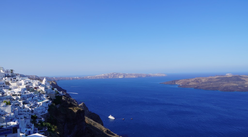 A view of Thira and of Thólos Naftilos, Santorini